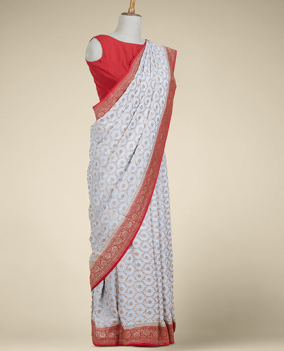 Cream floral jaal jacquard banaras georgette saree, contrast floral creeper border & intricate pallu