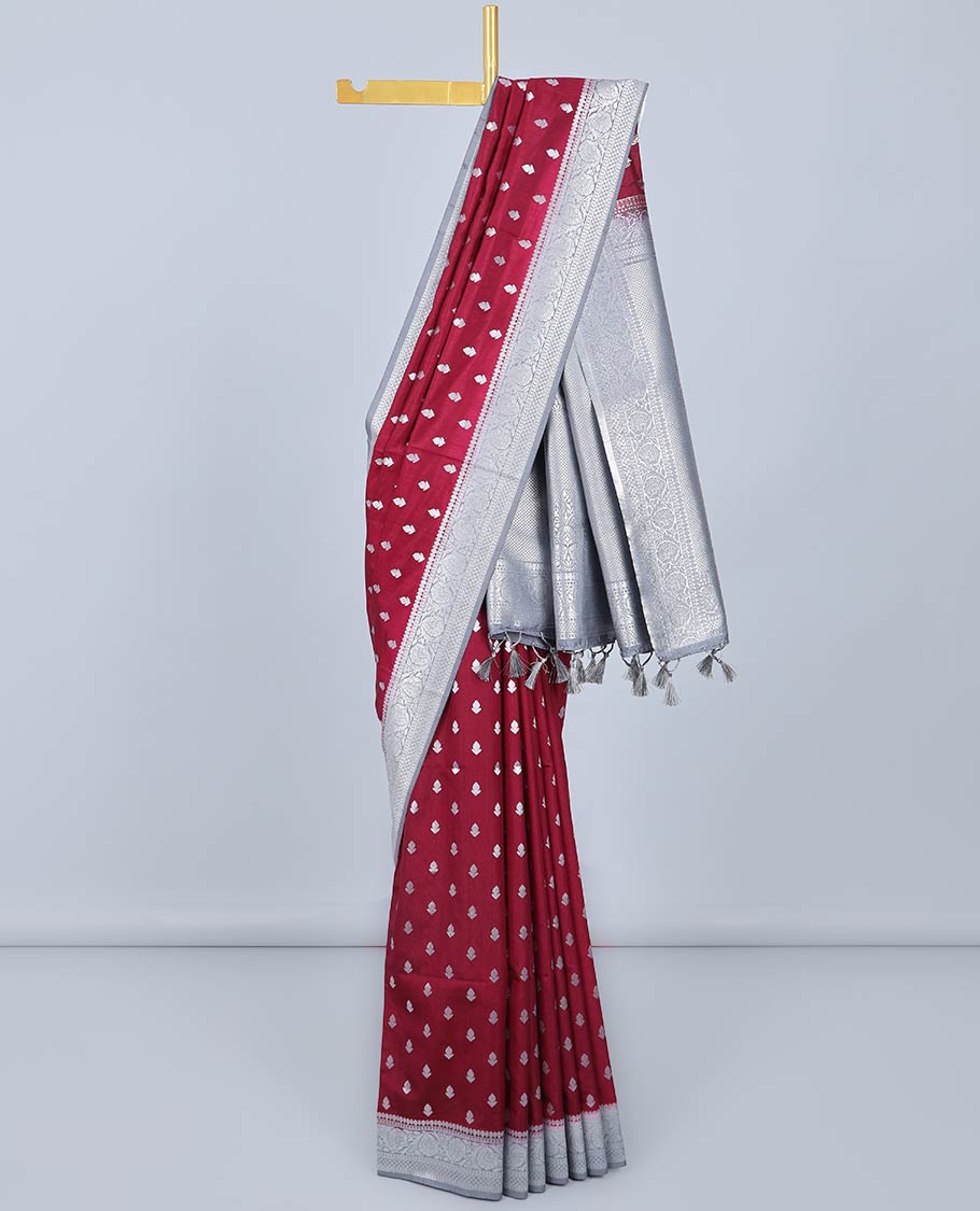 Maroon semi banaras dola saree with zari buttas, contrast zari border & intricately designed pallu
