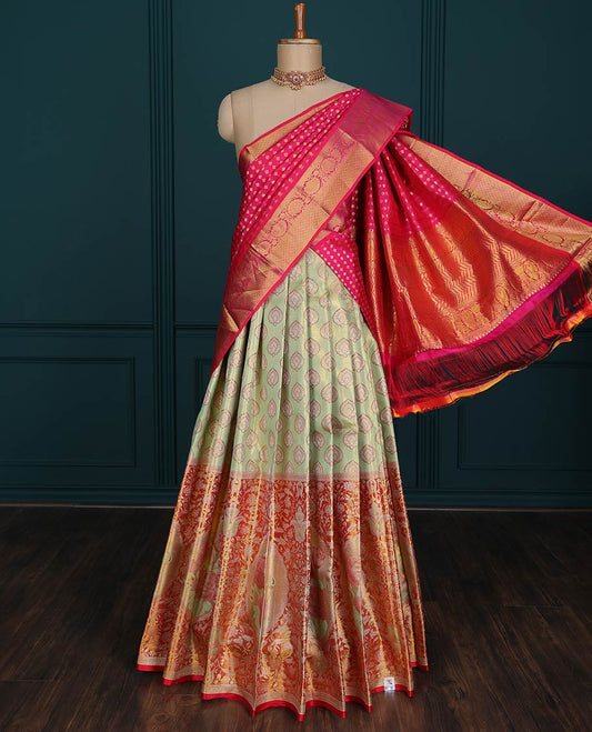 Green jacquard pure-silk half saree,contrast jacquard blouse & big border of floral designs & intricate dhavani