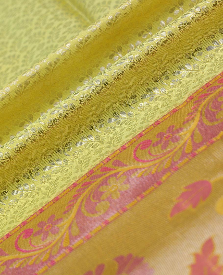 Yellow jacquard pure-silk half saree, contrast blouse, border of floral designs & dhavani of intricate designs