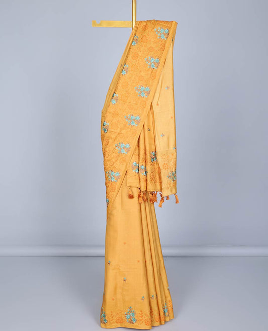 Borderless yellow floral vine thread embroidered semi-banaras jute saree, floral embroidered pallu