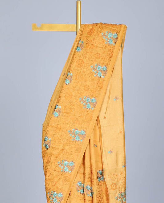 Borderless yellow floral vine thread embroidered semi-banaras jute saree, floral embroidered pallu