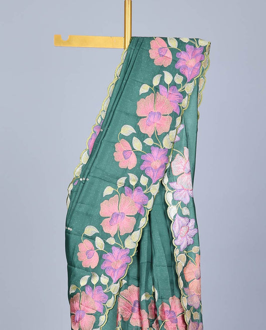 Green floral vine thread embroidered semi-banaras jute saree with polka dots, scallop border & embroidered pallu