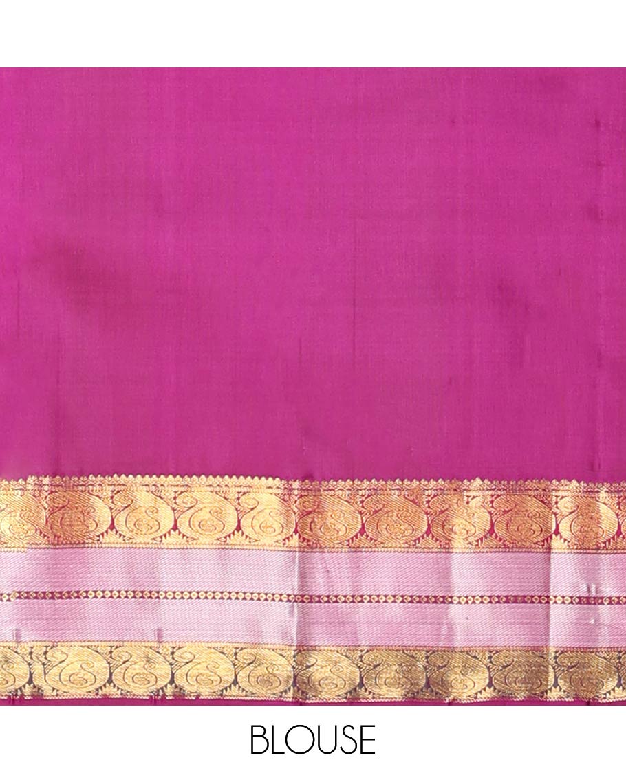 Yellow embossed silk saree with sparkling zari stripes, intricate pallu & zari border of thilakam mokku & manga designs