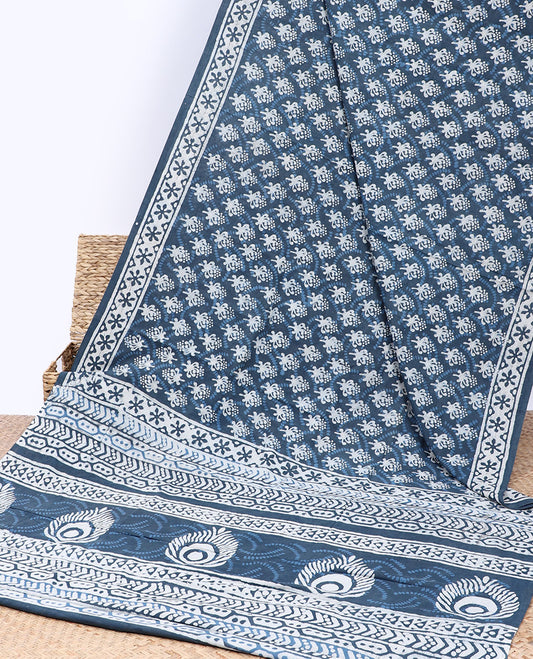 Blue unique printed mul-mul-cotton saree, batik-printed border & pallu of intriucate print