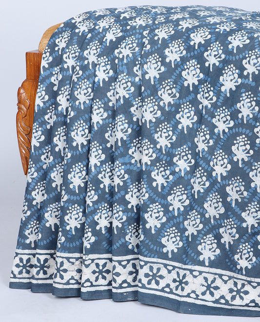Blue unique printed mul-mul-cotton saree, batik-printed border & pallu of intriucate print