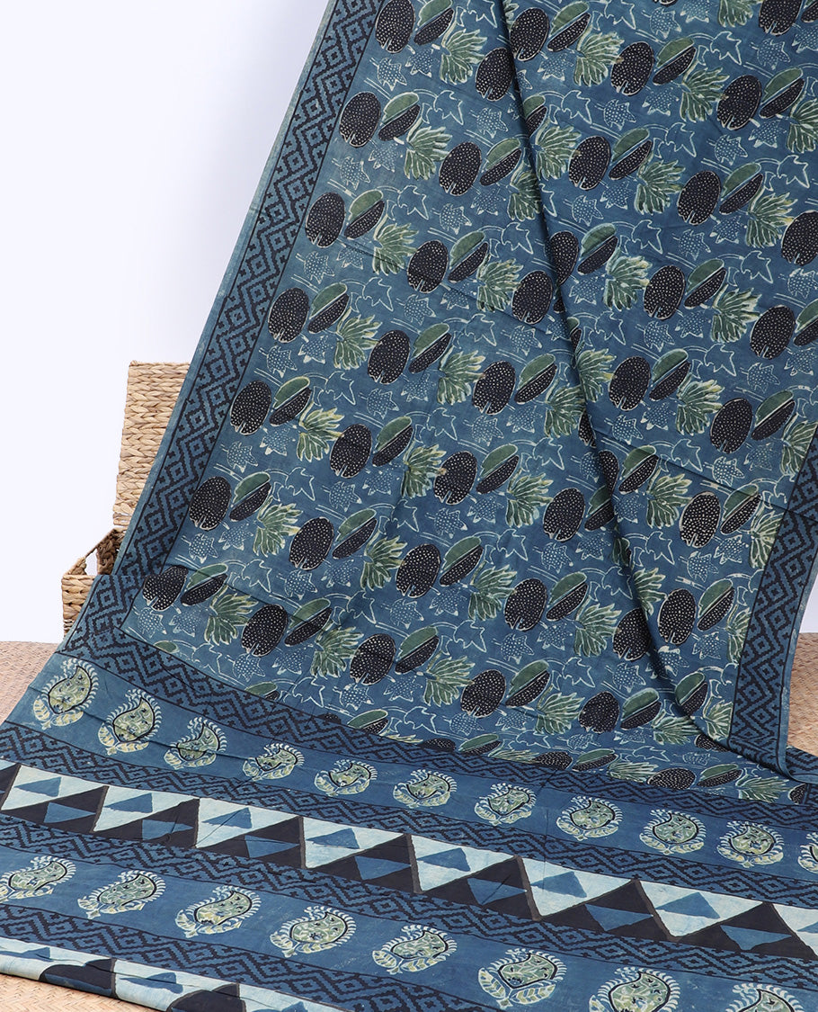 Blue floral printed mul-mul-cotton saree, geometric border & pallu of geometric & paisley print
