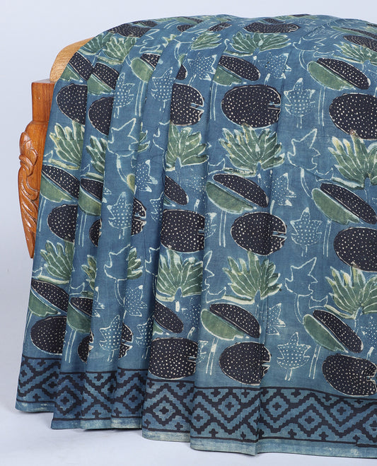 Blue floral printed mul-mul-cotton saree, geometric border & pallu of geometric & paisley print