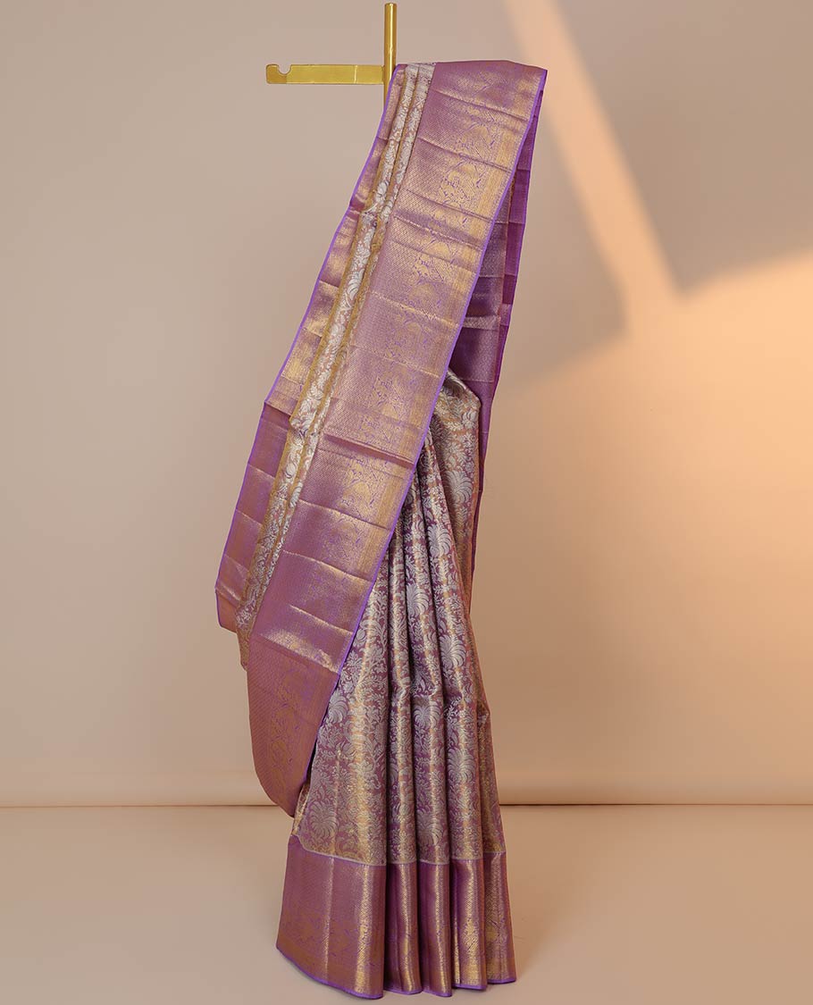 Violet floral jacquard silk saree, contrast border of thilakam,paisa,mayil kann & mayil designs & pallu of jaal designs