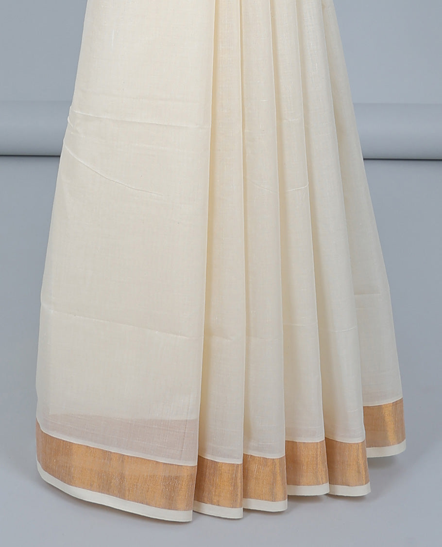 Cream kerala saree with zari stripes, plain border & pallu of floral zari designs