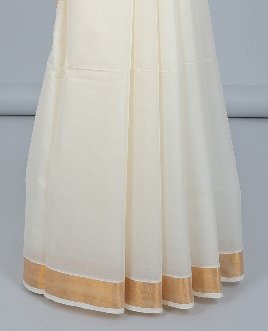 Cream kerala saree with zari stripes, plain border & pallu of zari designs