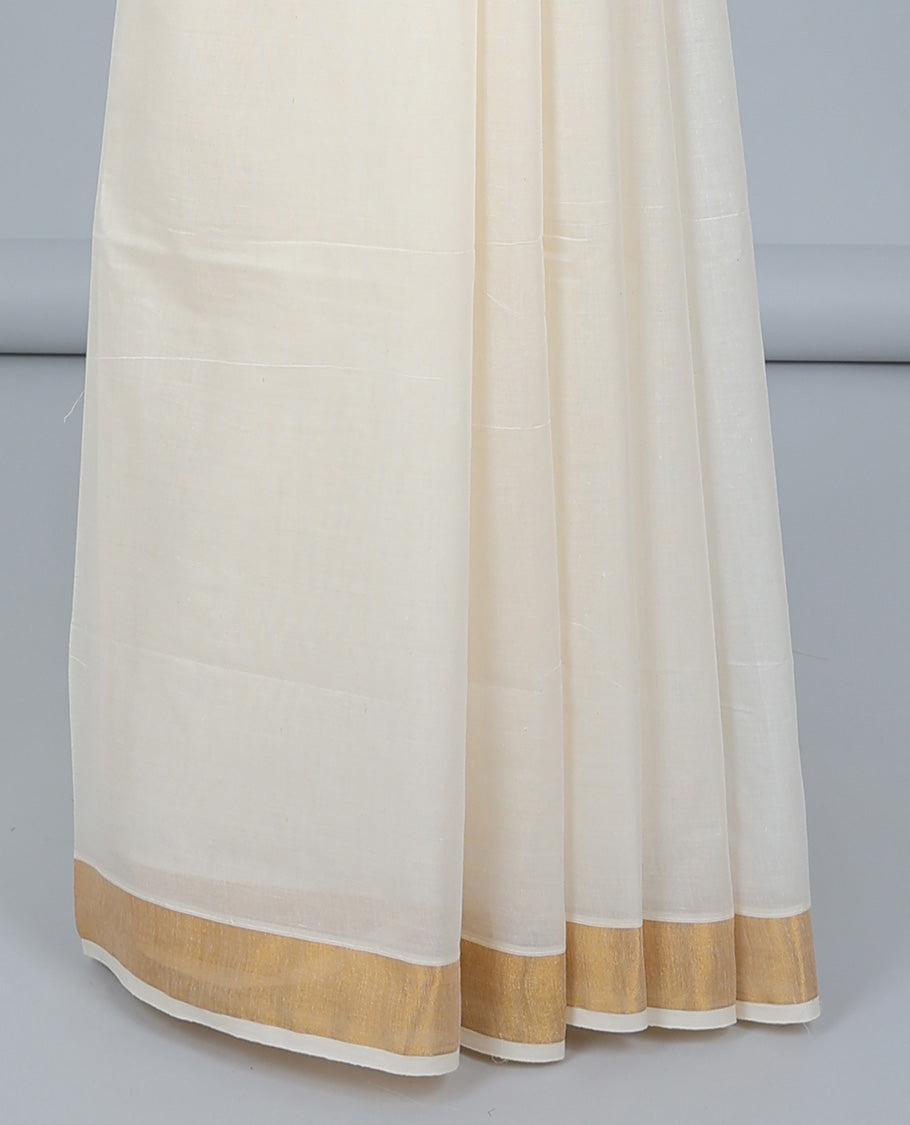 Cream kerala saree, plain border & pallu of peacock zari designs