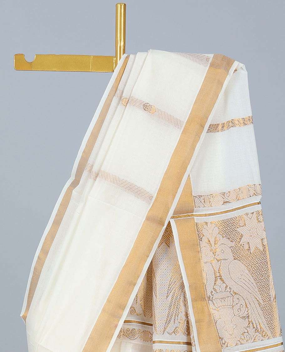 Cream kerala saree with zari designs, plain border & pallu of bird designs