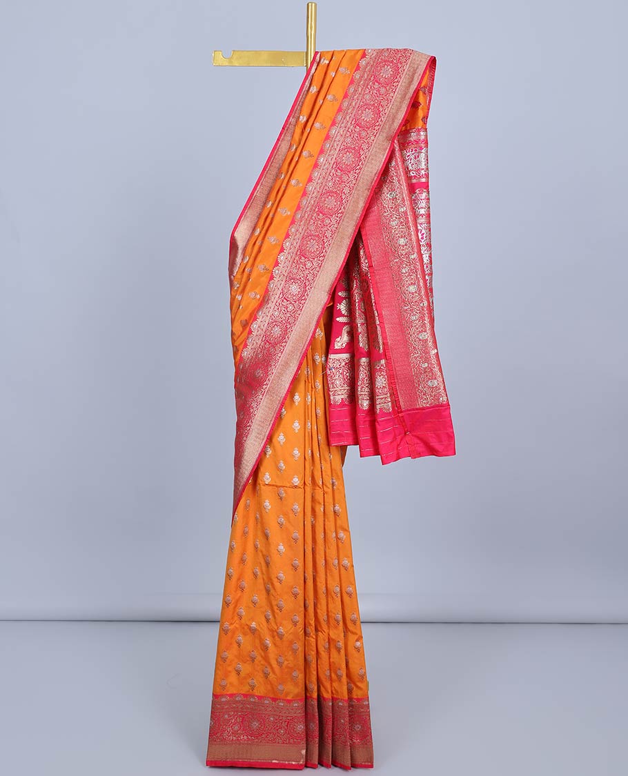 Orange semi-banaras jute saree with buttas, contrast border of floral designs & intricate floral pallu