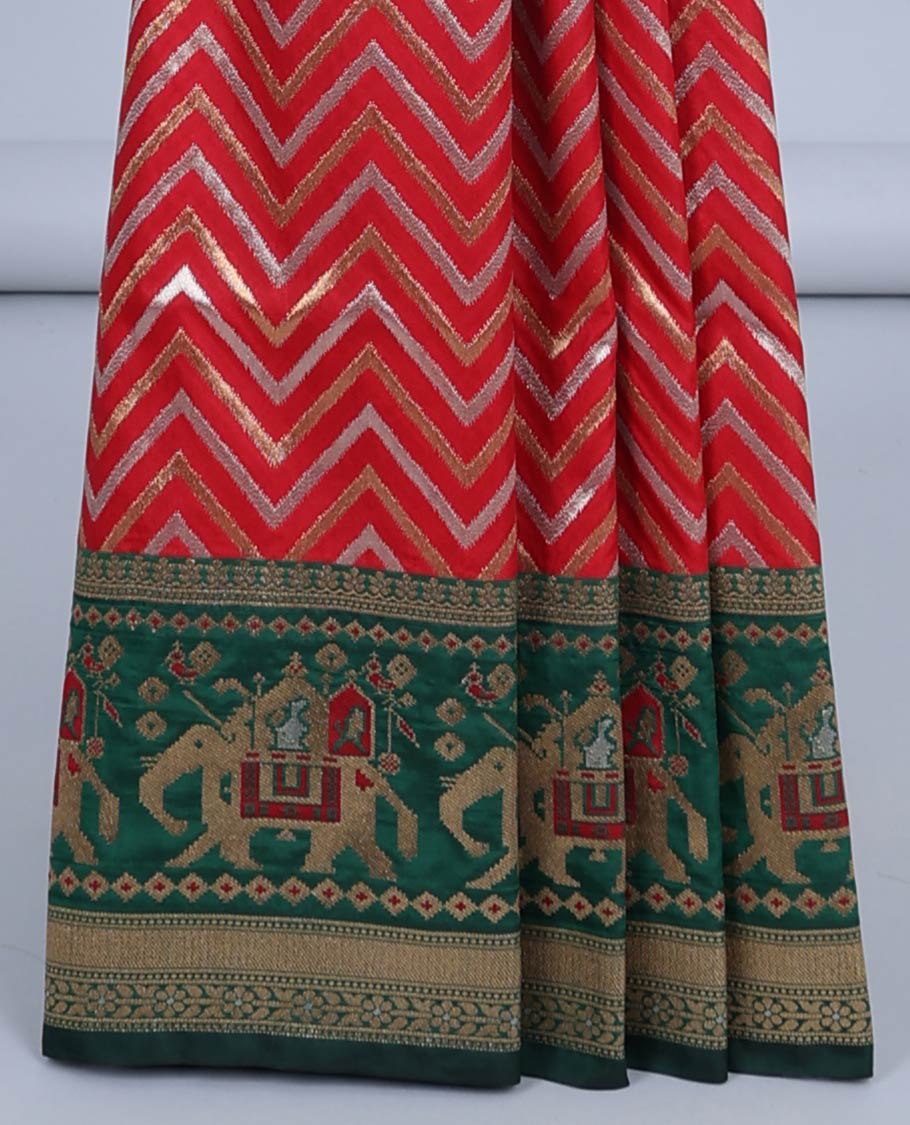 Red chevron jacquard semi-banaras jute saree, contrast patola-style border of elephant designs&pallu of intricate design