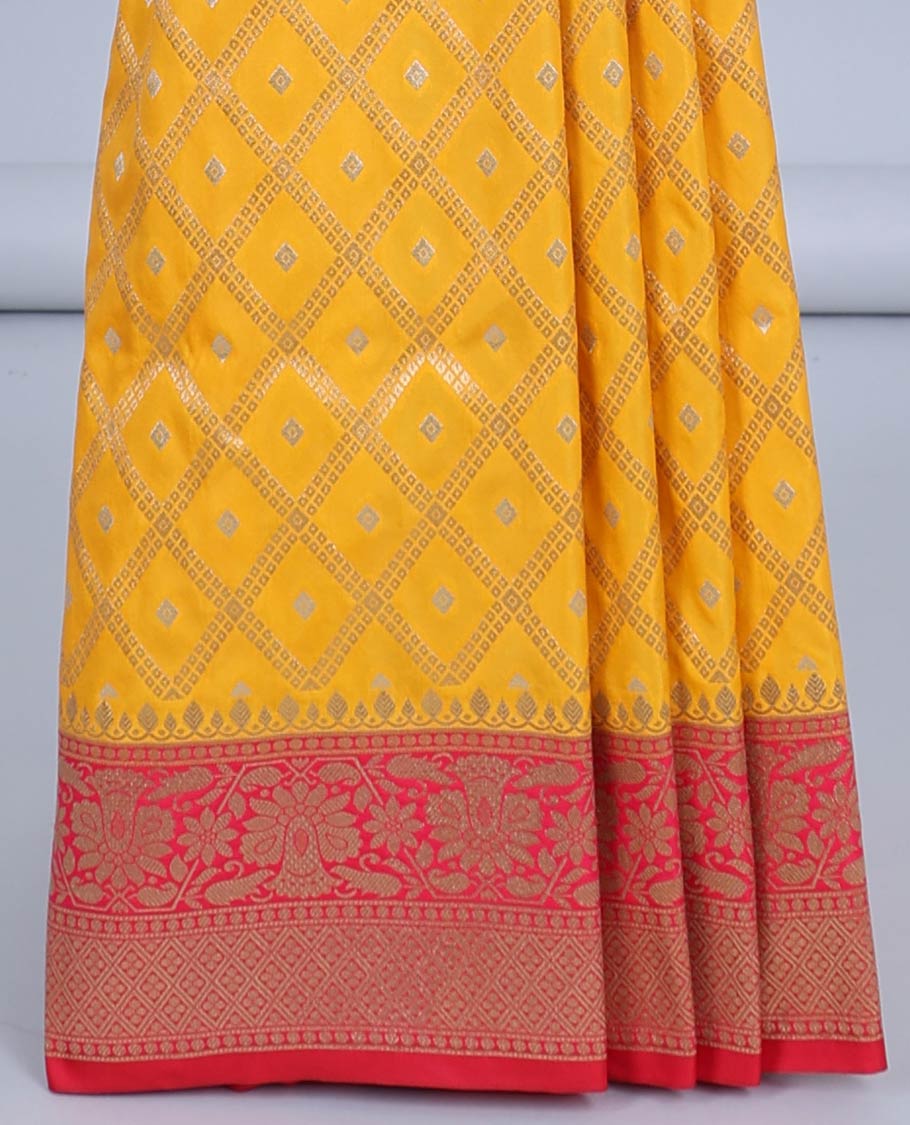 Yellow jaal jacquard semi-banaras jute saree, contrast floral design border & pallu of jaal designs