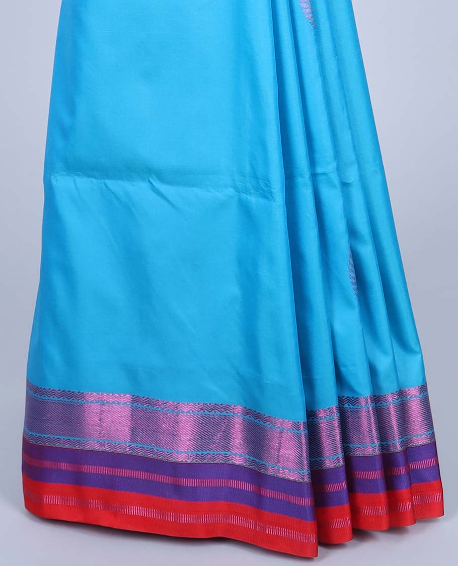 Blue semi-soft silk saree with zari buttas,zari border & pallu of intricate designs