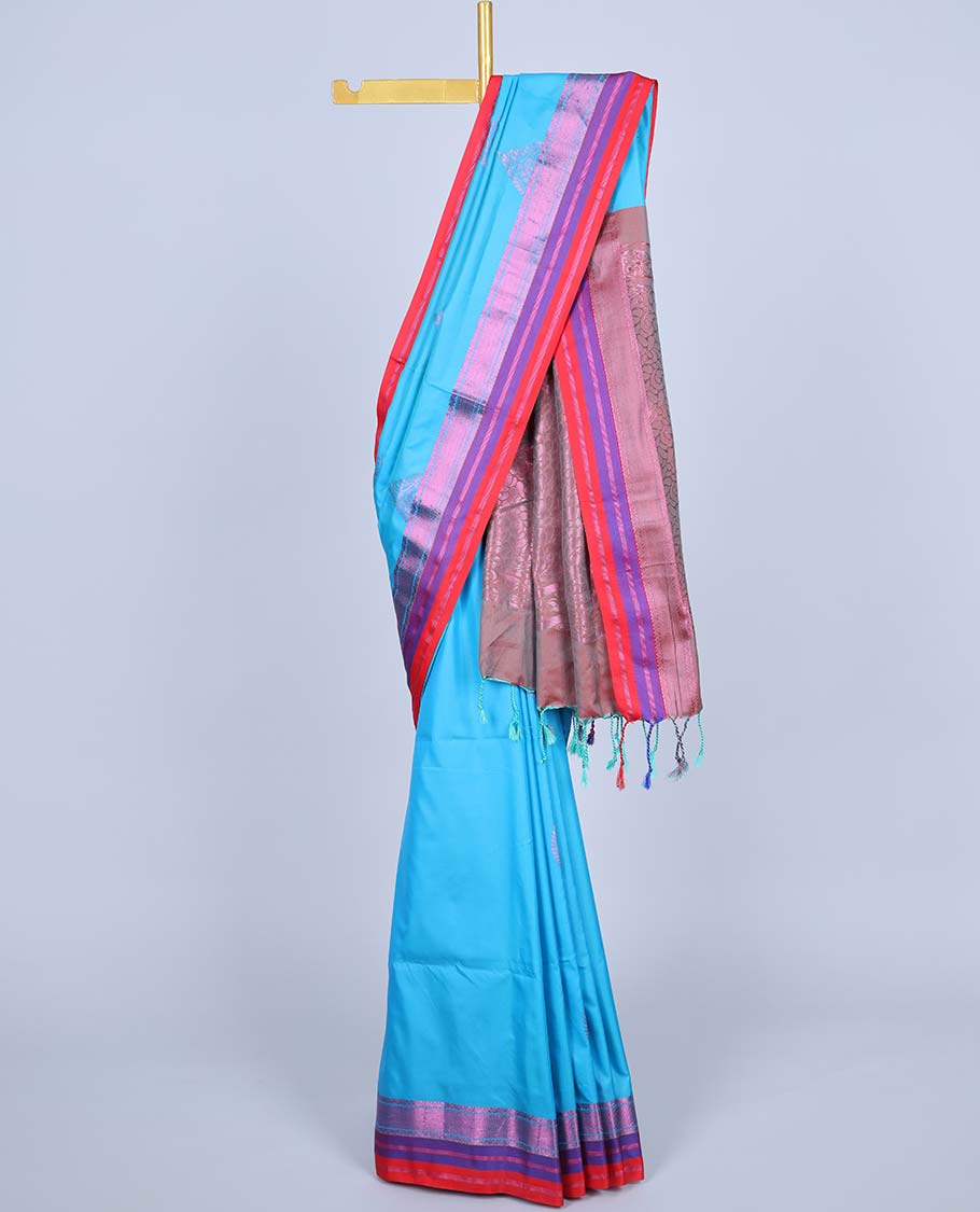Blue semi-soft silk saree with zari buttas,zari border & pallu of intricate designs