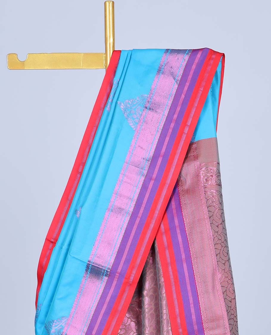 Blue semi-soft silk saree with zari buttas,zari border & pallu of intricate designs
