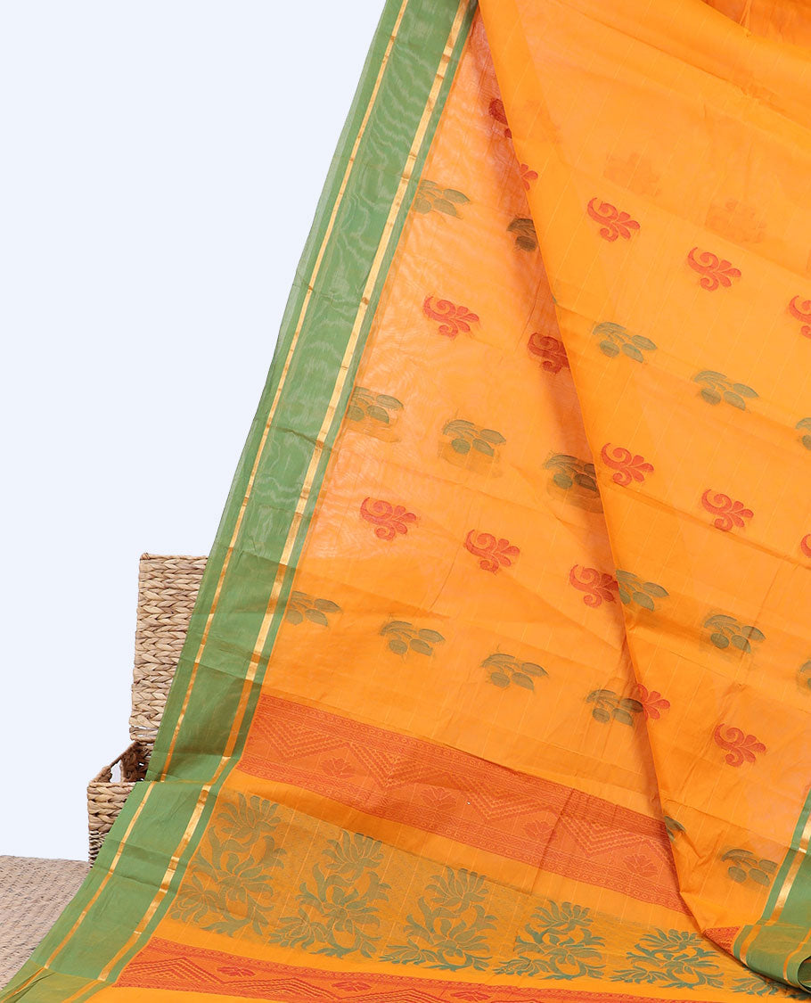 Orange kanchi cotton saree with buttas, contrast striped border & pallu of floral designs