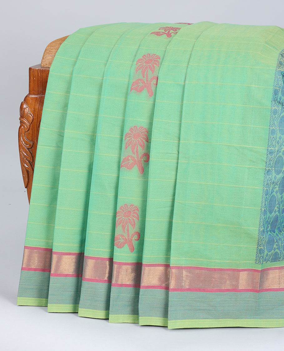 Green striped kanchi cotton saree with floral buttas, contrast border & pallu of intricate designs