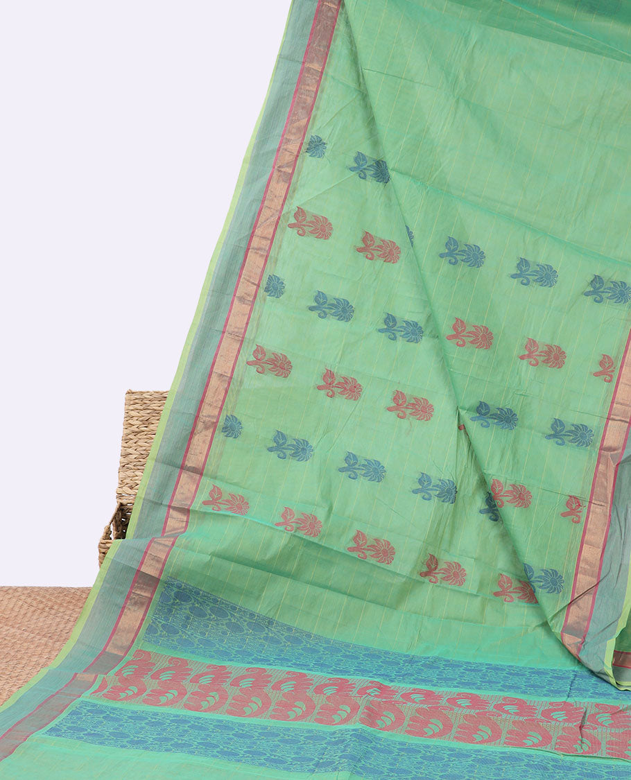 Green striped kanchi cotton saree with floral buttas, contrast border & pallu of intricate designs