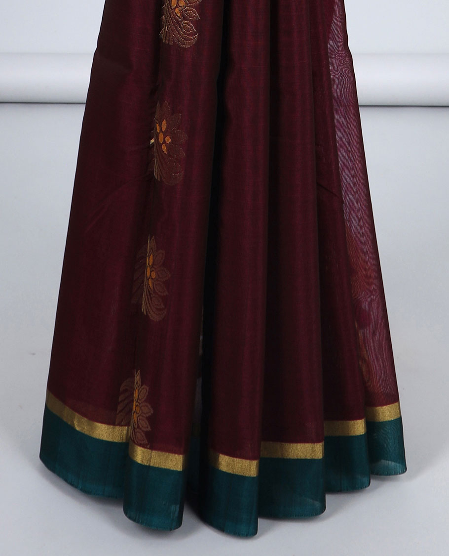 Maroon silk cotton saree with zari buttas, contrast plain border & pallu of floral zari designs