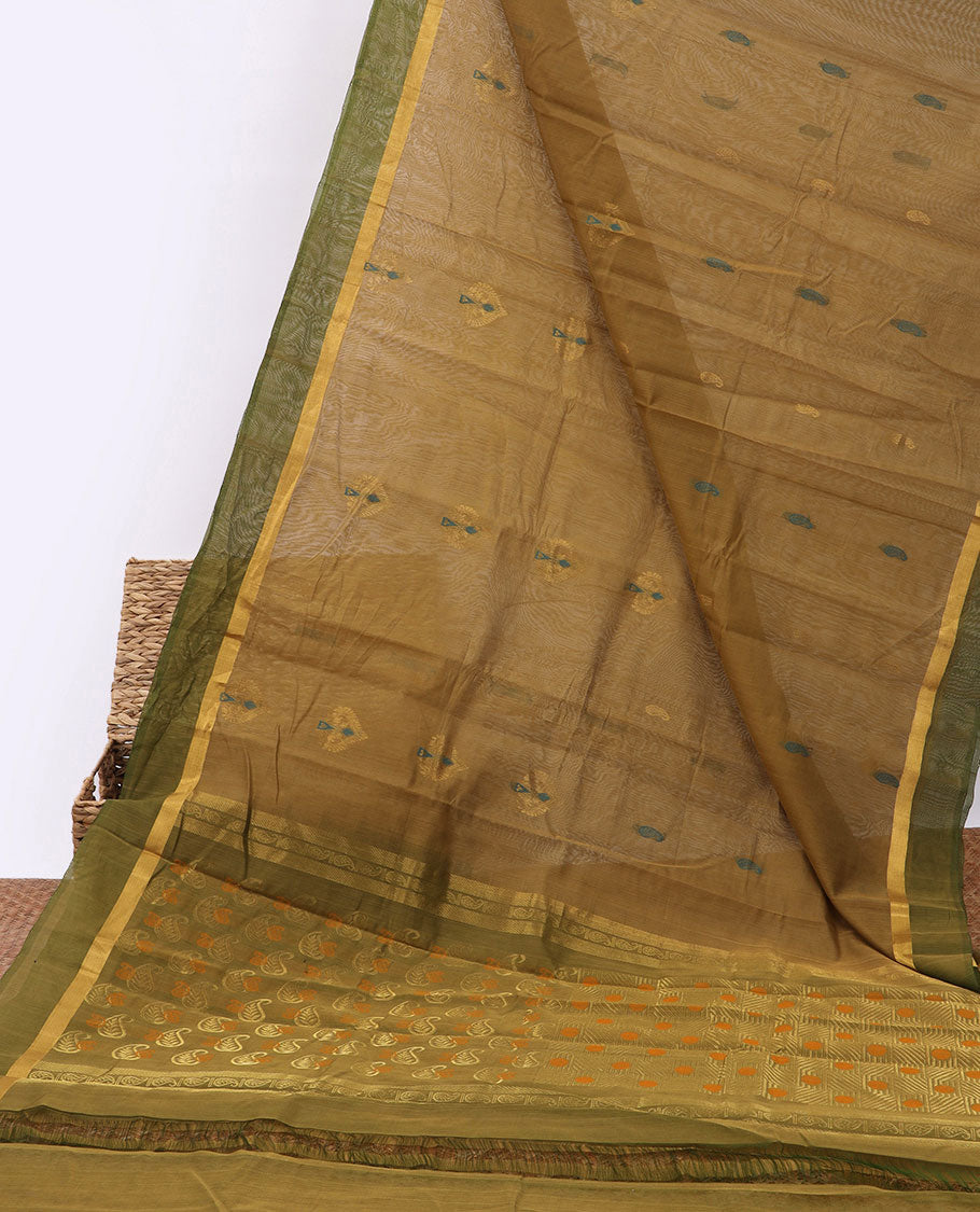 Green silk cotton saree with zari buttas, contrast plain border & pallu of paisley zari designs