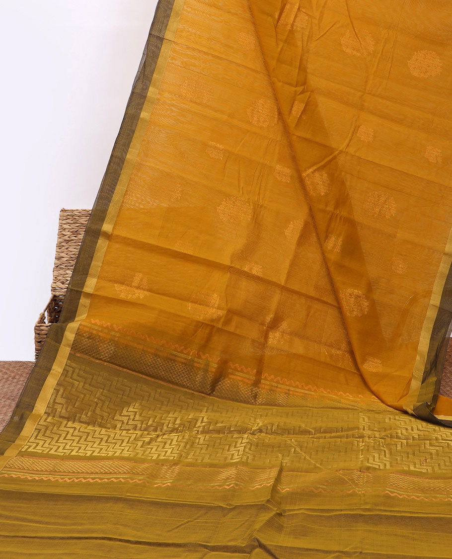 Yellow silk cotton saree with zari buttas, contrast plain border & pallu of zig-zag stripes, triangle & chevron stripes