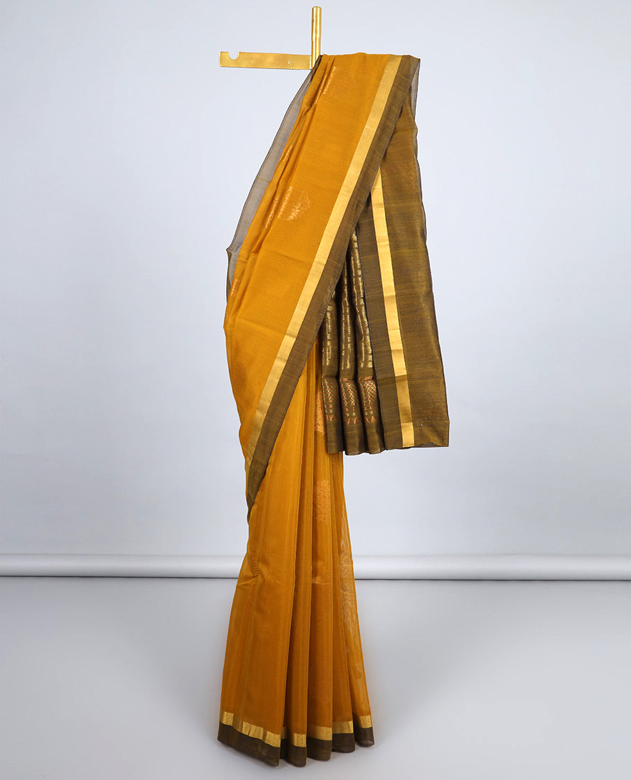 Yellow silk cotton saree with zari buttas, contrast plain border & pallu of zig-zag stripes, triangle & chevron stripes