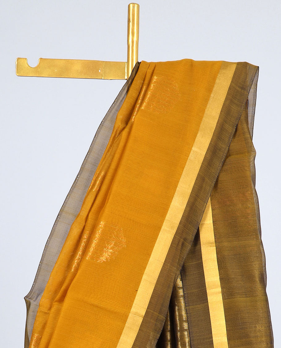 Yellow silk cotton saree with zari buttas, contrast plain border & pallu of zig-zag stripes, triangle & chevron stripes