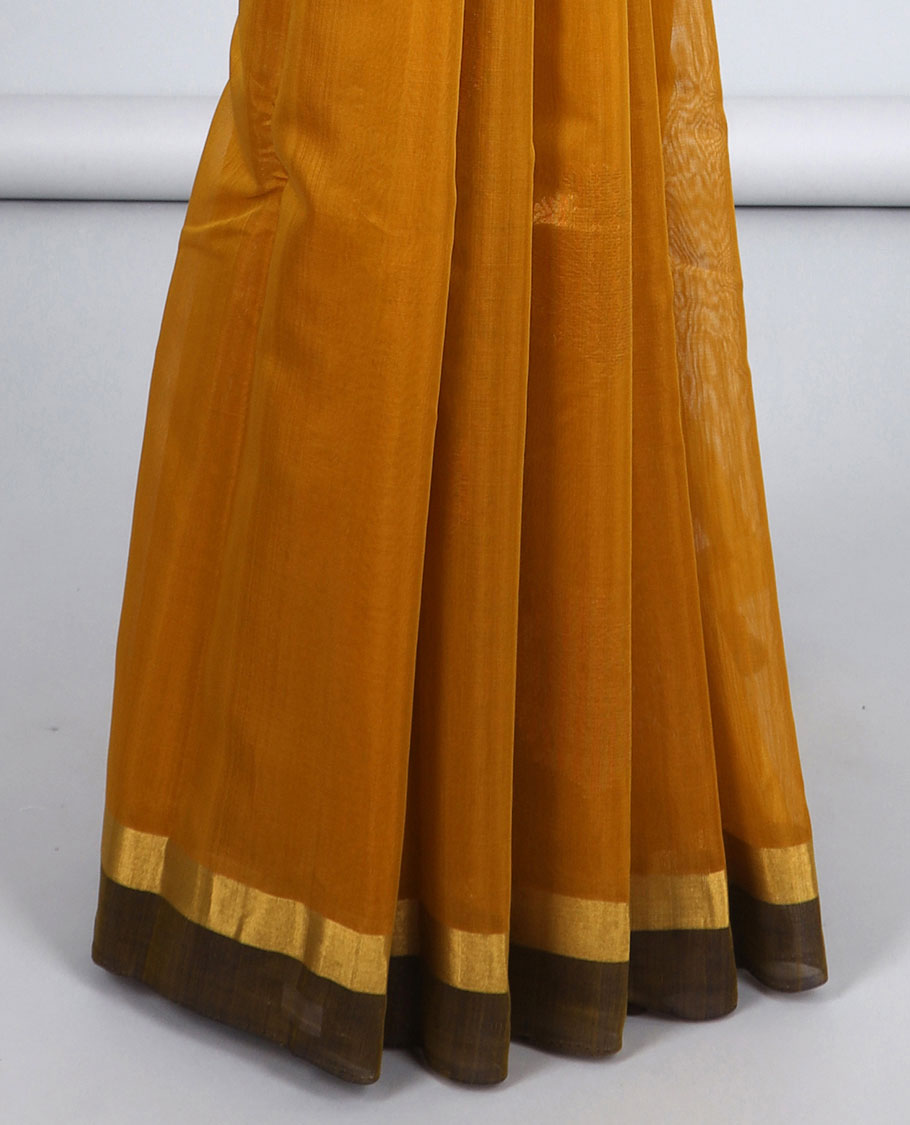 Yellow silk cotton saree with zari buttas, contrast plain border & pallu of zig-zag stripes, triangle & chevron stripes