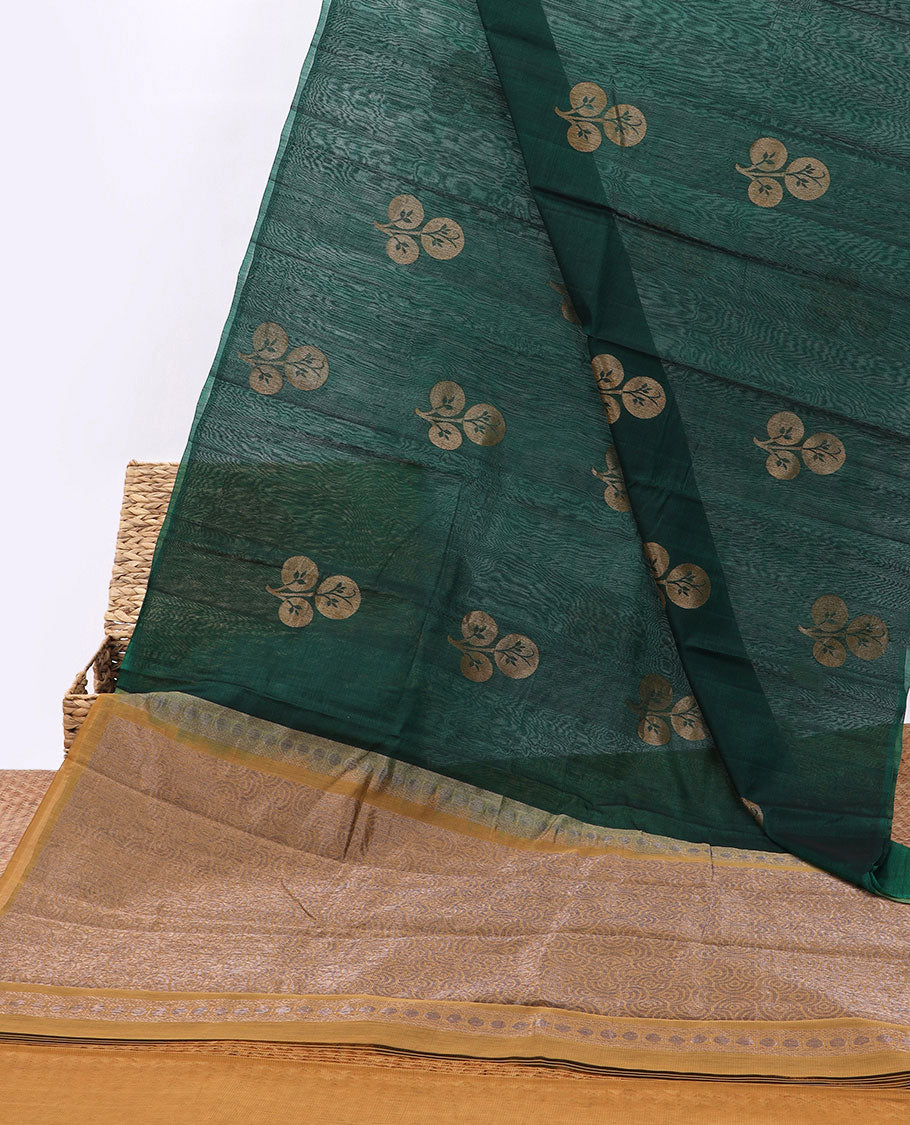 Borderless green silk cotton saree with floral buttas, contrast pallu of geometric designs
