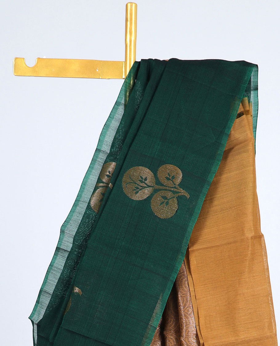 Borderless green silk cotton saree with floral buttas, contrast pallu of geometric designs