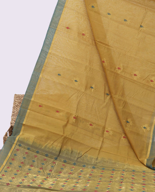 Mustard silk cotton saree with buttas, contrast plain border & pallu of chevron designs