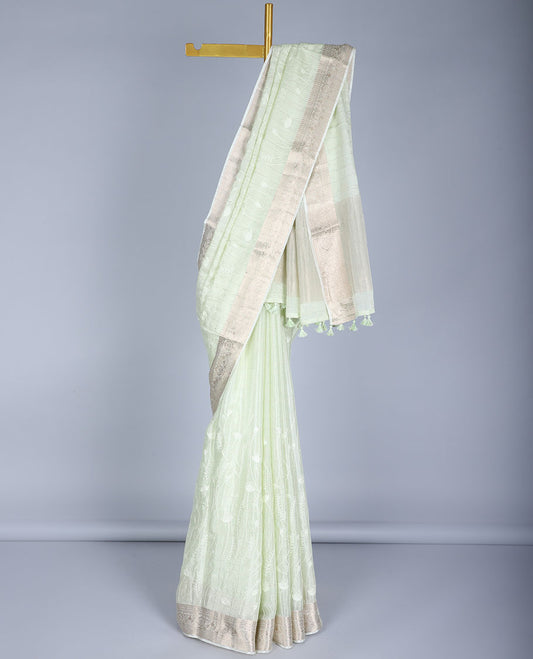 Green checked semi-banaras crepe saree with floral vine, traditional design border & zari striped pallu