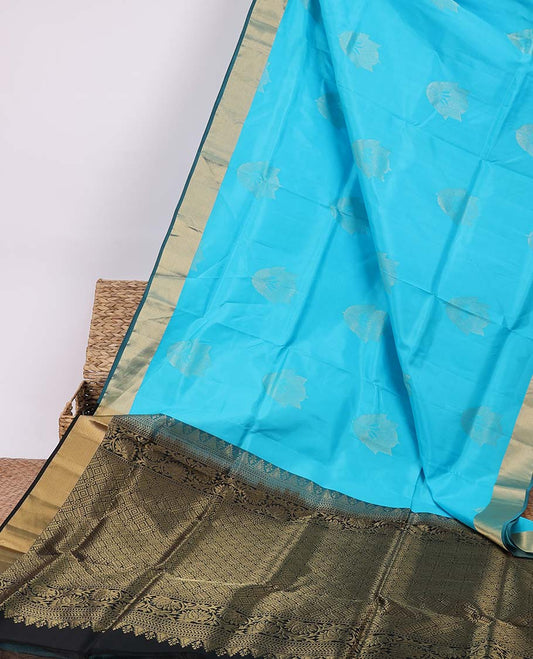 Blue silk saree with zari buttas, contrast bavanji border & pallu of kathir,muthu,kodi visiry & jaal designs