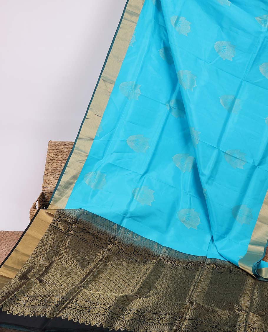 Blue silk saree with zari buttas, contrast bavanji border & pallu of kathir,muthu,kodi visiry & jaal designs