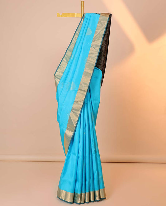 Blue silk saree with zari buttas, contrast bavanji border & pallu of kathir,muthu,kodi visiry & jaal designs