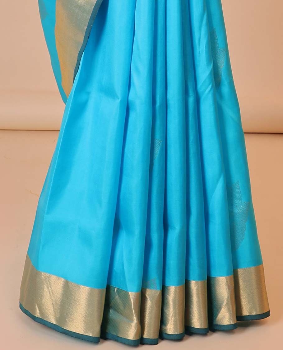 Blue silk saree with zari buttas, contrast bavanji border & pallu of kathir,muthu,kodi visiry & jaal designs