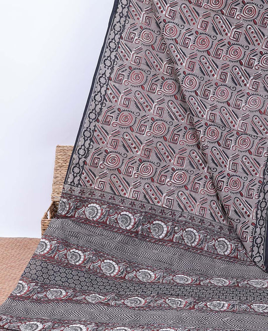 Grey geometric printed mul-mul cotton saree, self-border & pallu of chevron & floral creeper print
