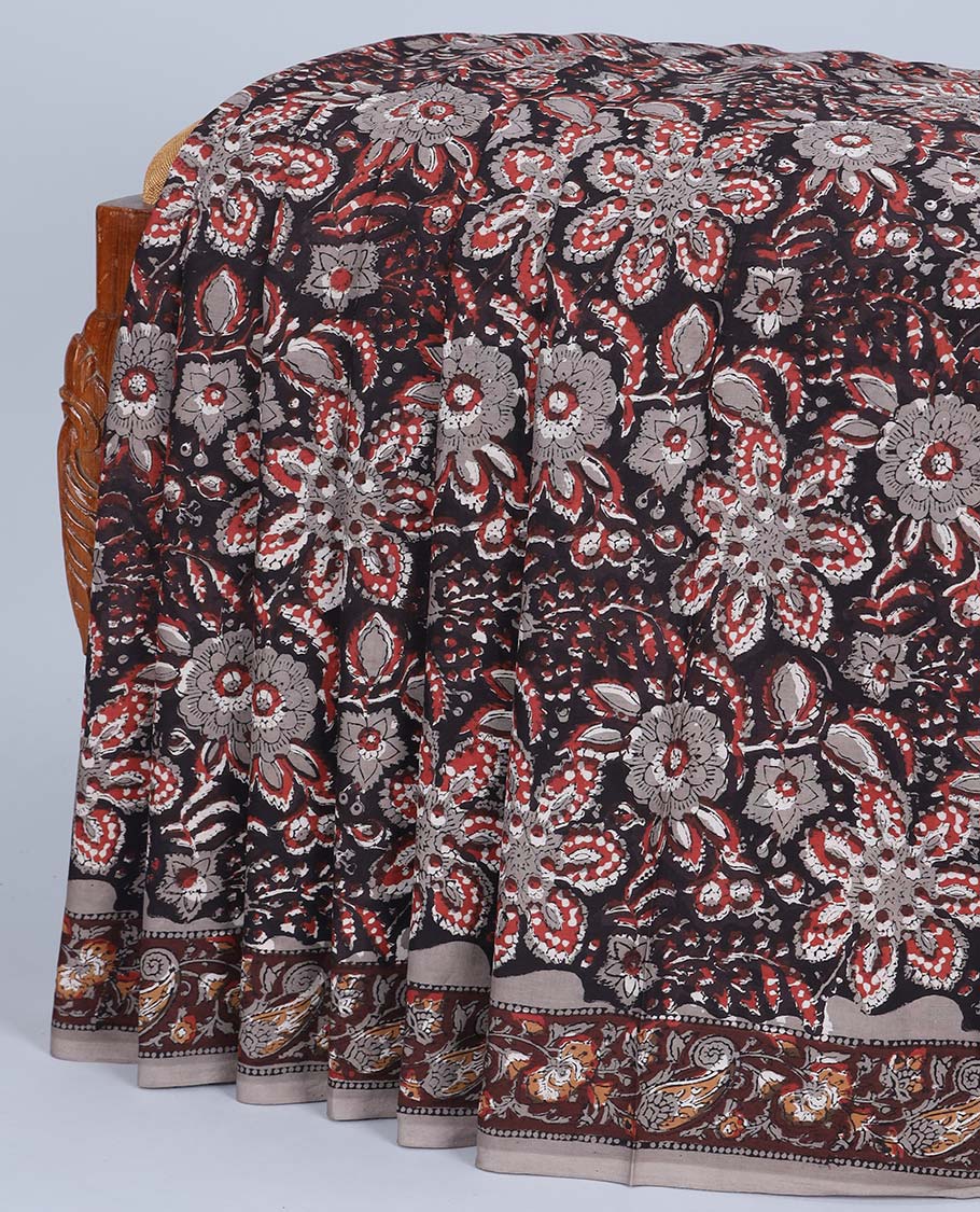 Black floral printed mul-mul cotton saree, contrast paisley print border & pallu of floral vine print