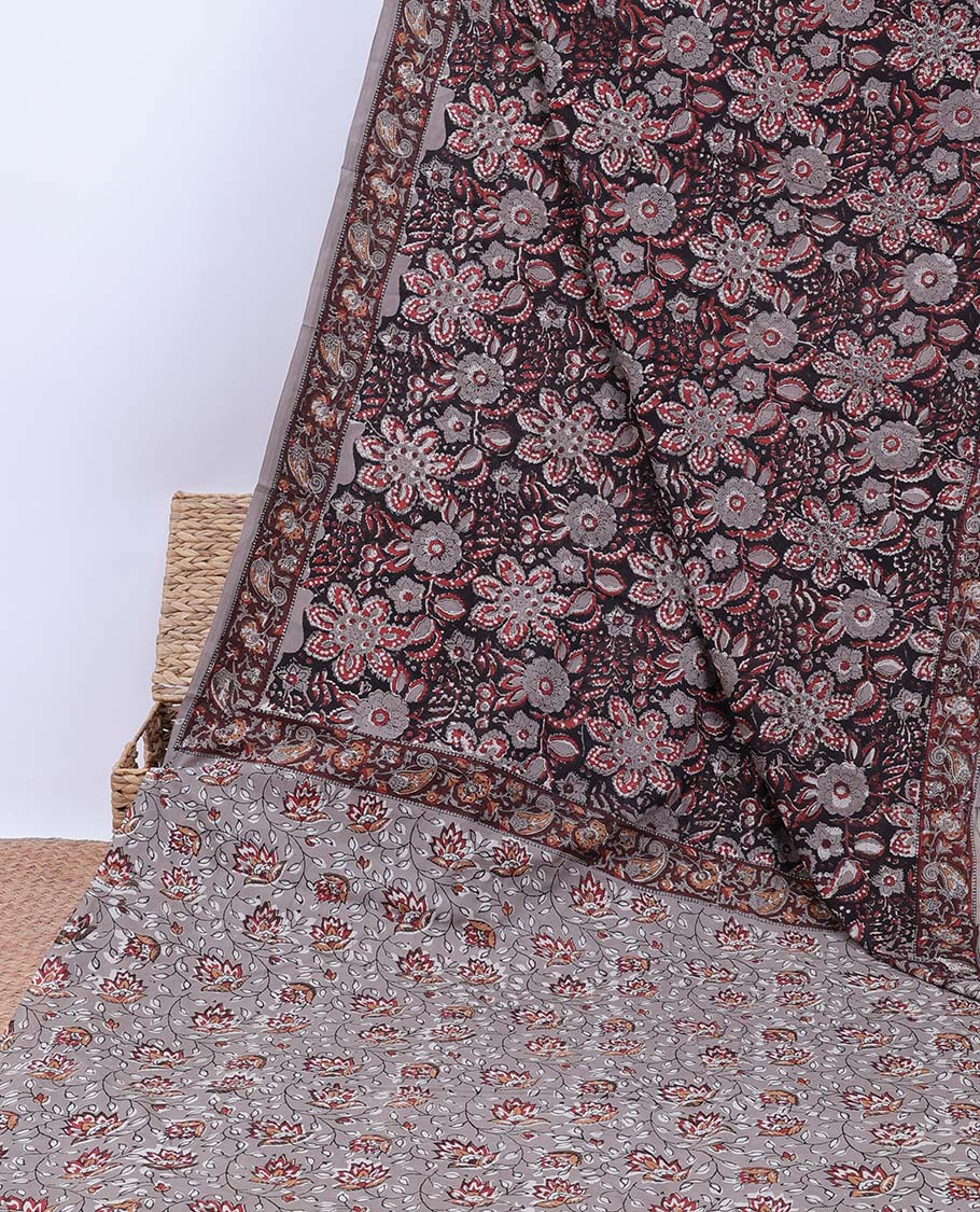 Black floral printed mul-mul cotton saree, contrast paisley print border & pallu of floral vine print