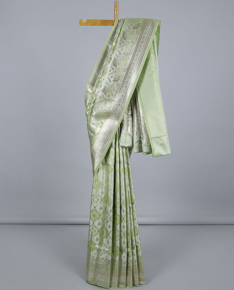 Green ogee jacquard semi banaras satin saree, floral creeper zari border & pallu of floral designs