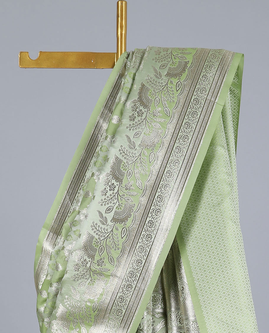 Green ogee jacquard semi banaras satin saree, floral creeper zari border & pallu of floral designs