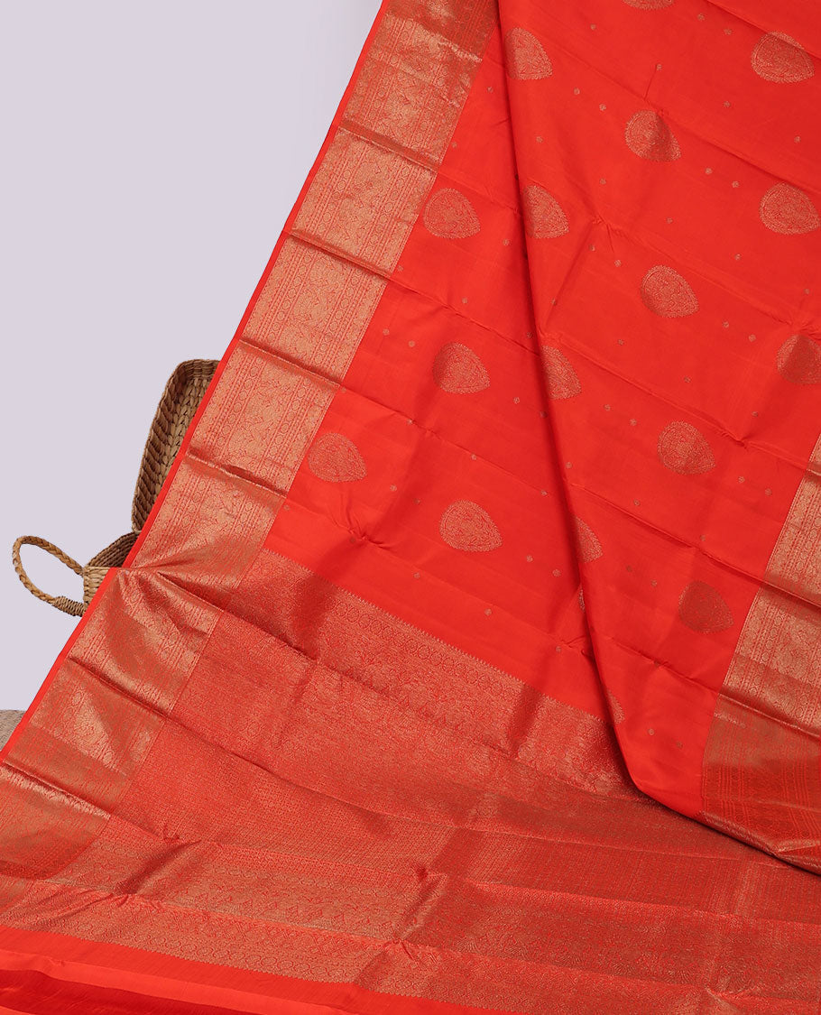 Orange buttas Kanchipuram silksaree, pallu flanked by iruthalai pakshi & border of kamalam,manga,iruthalai pakshi