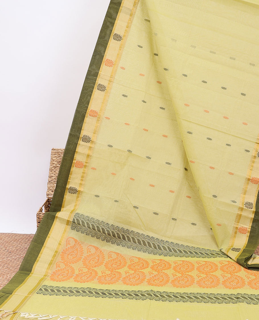Green kanchi cotton saree with buttas, contrast traditional zari design border & pallu of leaf chevron & paisleys
