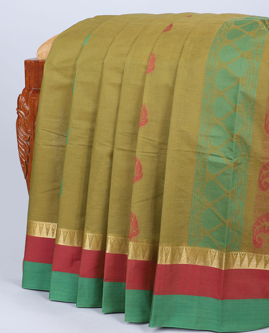 Green kanchi cotton saree with buttas, contrast double-color temple border & pallu of paisleys