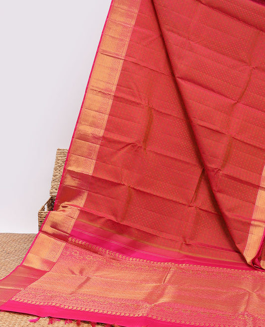 Orange embossed silksaree,contrast jaal design pallu & border of thilakam mokku,kathir,mayil & zari stripes