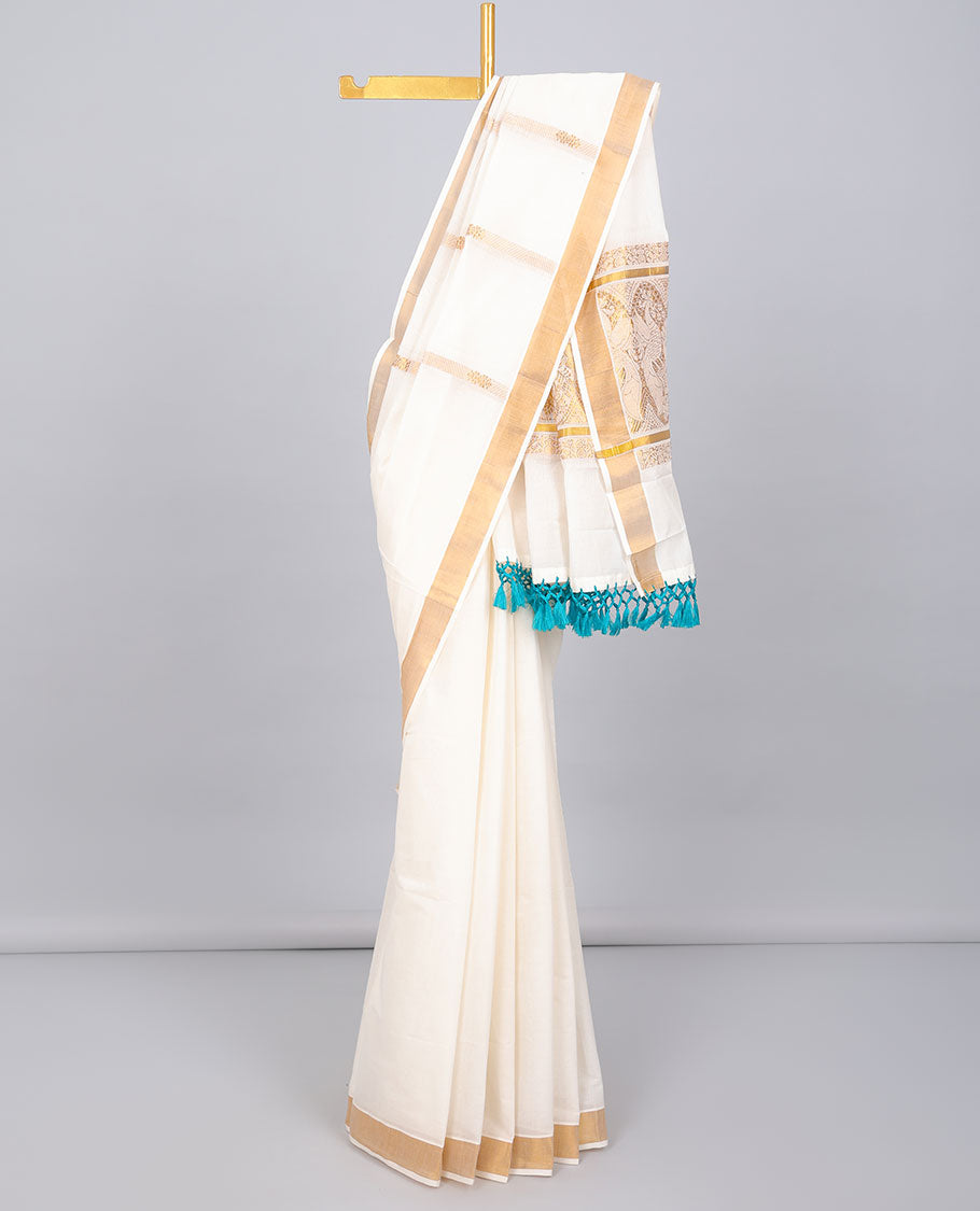 Cream kerala saree with zari stripes, zari border & pallu of peacock designs in zari